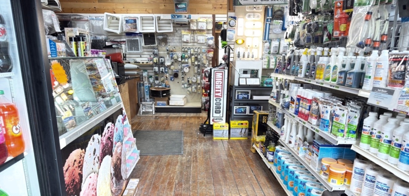 Inside the Idle Wheels convenience store — RV supplies, snacks, drinks, and propane